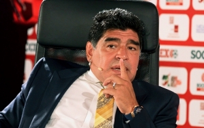 Argentina football legend Diego Maradona speaks on the second day of the SoccerEx Asian Forum conference in Southern Shuneh, Jordan, Monday, May 4, 2015. (AP Photo/Raad Adayleh)